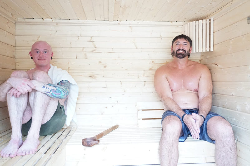 Two team members relaxing in one of our saunas